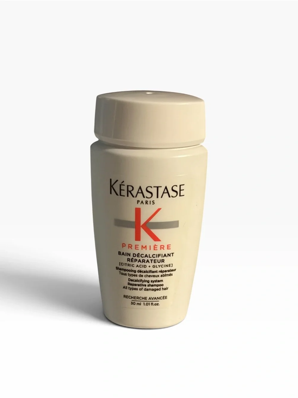 Kérastase Première Repairing Shampoo - Cream and Red Accents